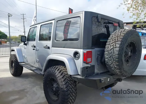 2015 Jeep Wrangler Unlimited Sahara from USA, damaged, VIN 1C4BJWEG9FL756173